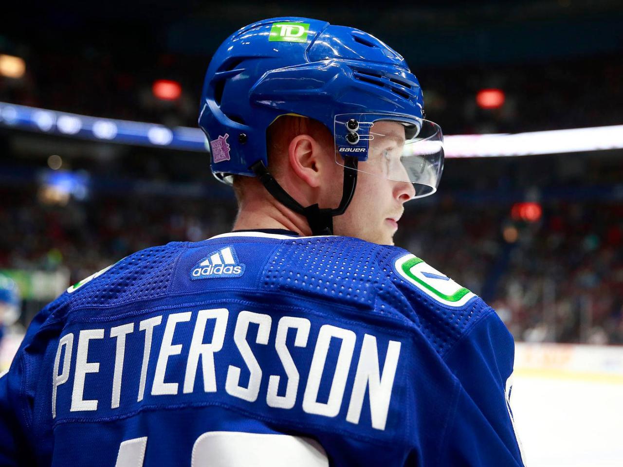 Canucks place star F Pettersson on retroactive IR, recall G Silovs